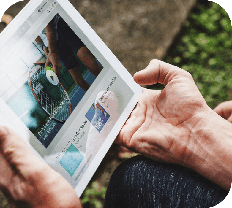 A reader exploring learning content on a tablet
